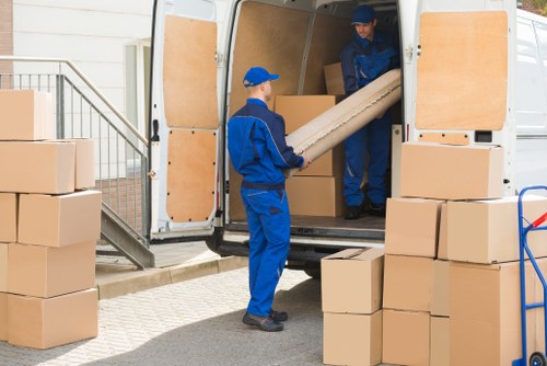 Professional packing team preparing household items in Colneyhatch