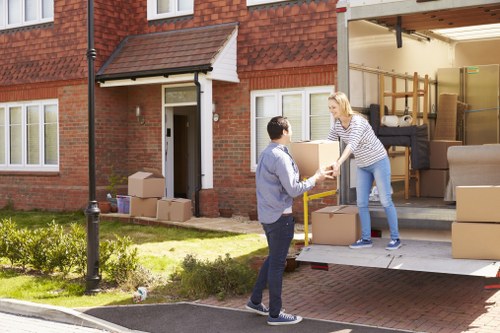 Removal van and moving team ready for a Colneyhatch home move