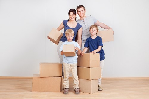 Careful furniture handling during a home move in north London