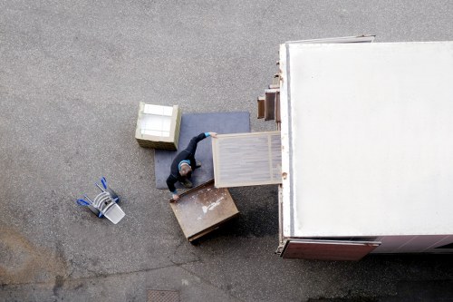 Packed business equipment and labelled boxes ready for a commercial move
