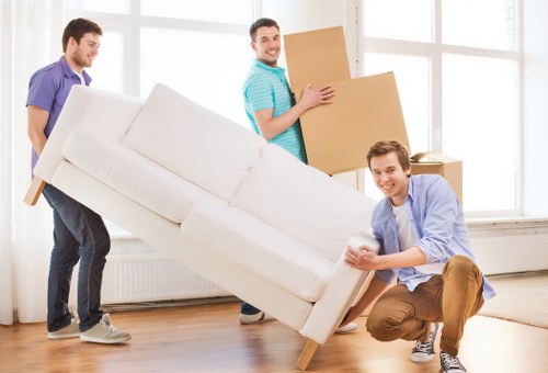 Removal van loading furniture from a Colneyhatch property