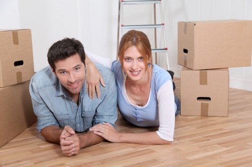 Careful loading of household items into a moving van