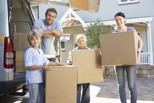 A moving van and packed belongings ready for a local Colneyhatch move