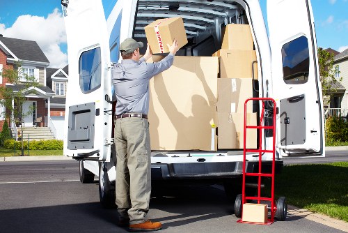 Packed boxes and furniture ready for removals in Colneyhatch