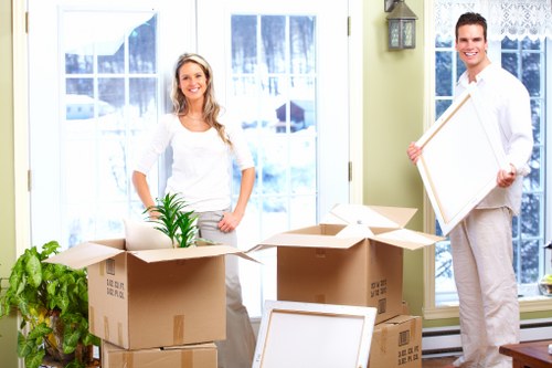 Local removals crew managing access and loading for a Colneyhatch business