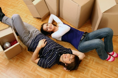 Local movers loading furniture for a property move near Colneyhatch