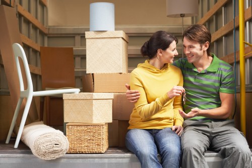 Careful unpacking service arranging boxes in a new Colneyhatch home