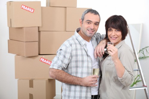 Packed boxes and furniture ready for a Colneyhatch home move